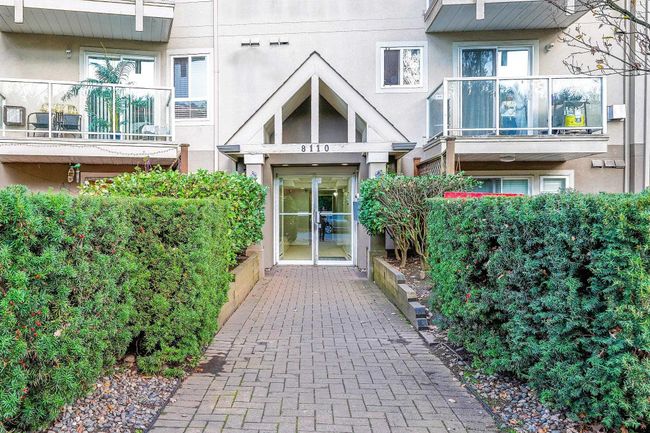 View of exterior entry with stucco siding | Image 15