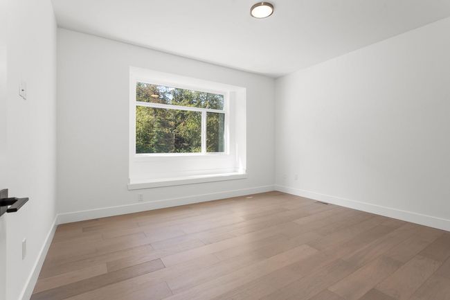 Unfurnished room featuring baseboards and wood finished floors | Image 25