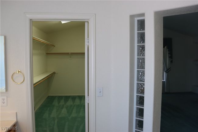 Walk in closet featuring carpet flooring | Image 47
