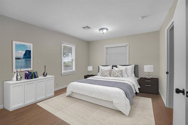 Bedroom with light hardwood / wood-style flooring | Image 30