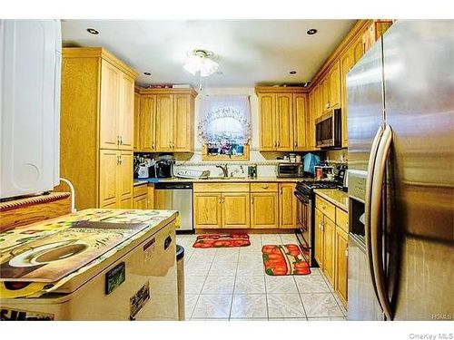 2042 Valentine Ave, Bronx, NY, 10457-3801 | Card Image