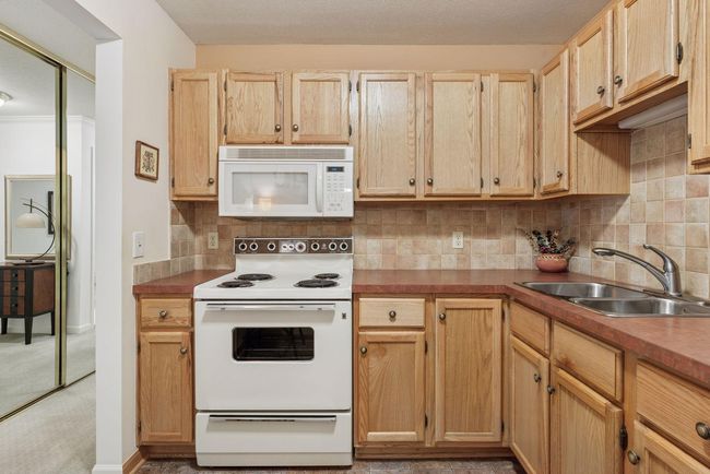 Efficient design with generous cabinetry and easy access to everyday essentials | Image 4