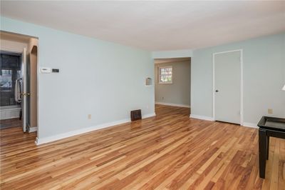 As You Enter The Home You Are Greeted By Gleaming Hardwood Floors And A Light And Bright Decor. (Coat Closet In The Rear Of The Photo) | Image 2