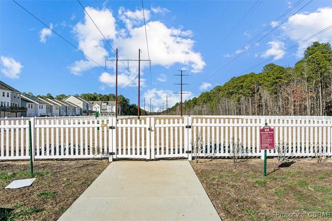 View of gate featuring fence and a residential view | Image 28