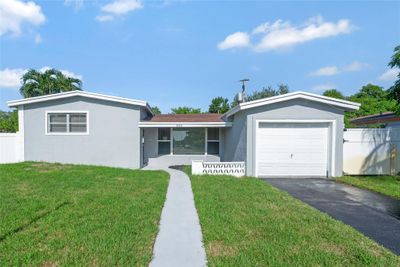 3303 Nw 37 Th Av, House other with 3 bedrooms, 2 bathrooms and null parking in Lauderdale Lakes FL | Image 1