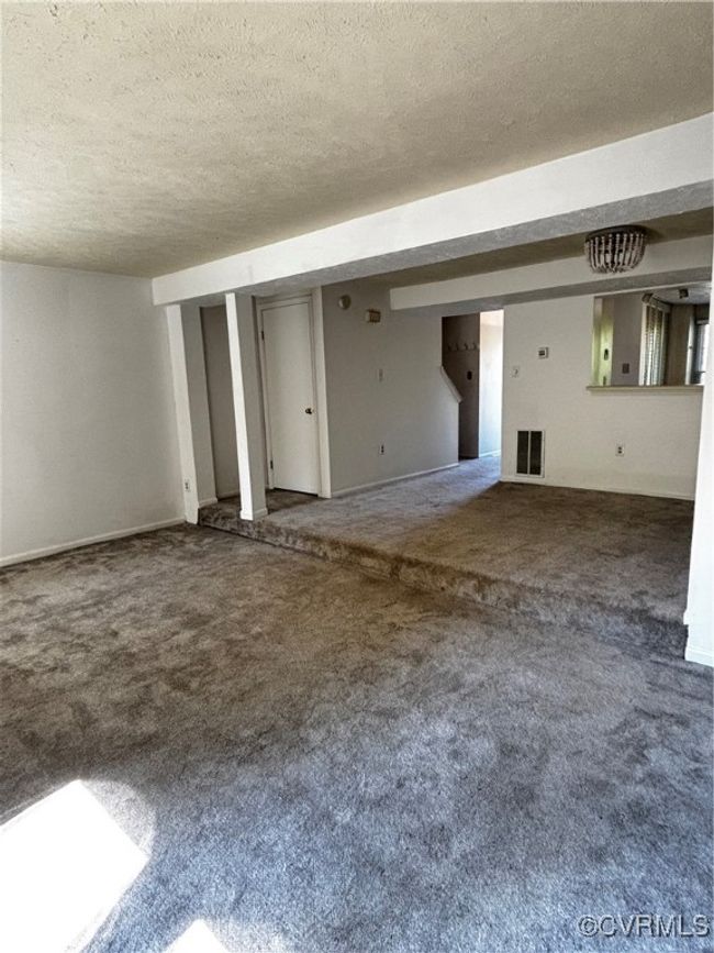 Room featuring carpet flooring and a textured ceiling | Image 7