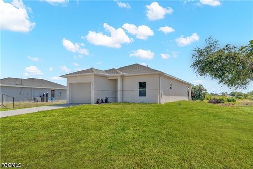 917 Margaret Ave S, LEHIGH ACRES, FL, 33974-4575 | Card Image