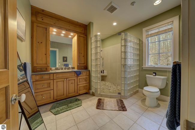 3970 N West Torch Lake Dr, House other with 4 bedrooms, 5 bathrooms and null parking in Kewadin MI | Image 53
