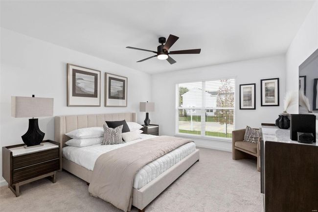 Carpeted bedroom with ceiling fan | Image 24