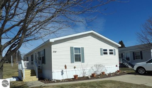 378 Thistlewood Dr, Cadillac, MI, 49601-3632 | Card Image