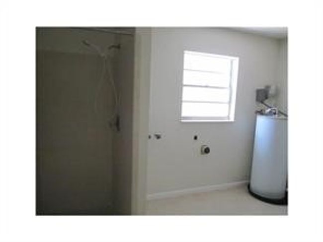 Washer and dryer hook up, walk-in shower | Image 11