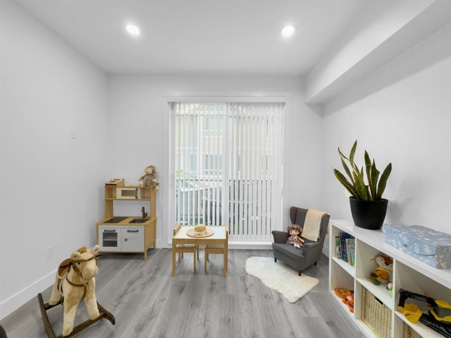 Sitting room with recessed lighting, wood finished floors, and baseboards | Image 8