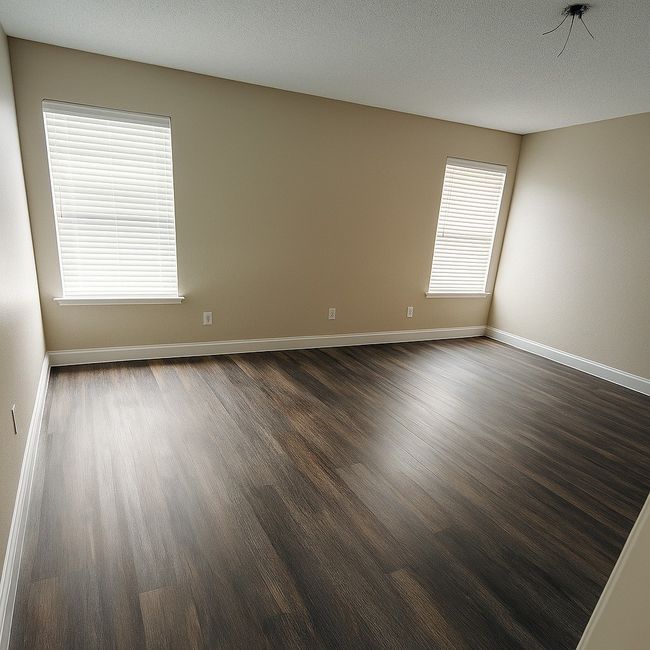 Spare room featuring dark wood finished floors | Image 10