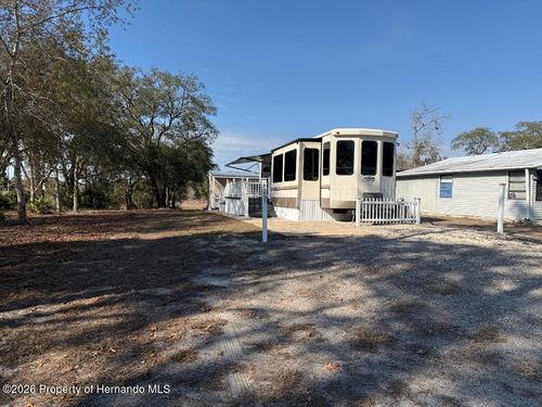 9265 Grizzly Bear Ln, WEEKI WACHEE, FL, 34613-3963 | Card Image