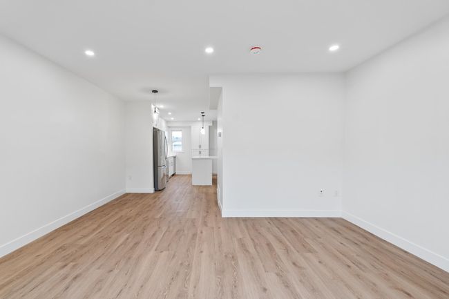 Unfurnished living room with recessed lighting, light wood-style flooring, and baseboards | Image 24