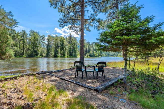 Serene Riverside Seating | Image 27