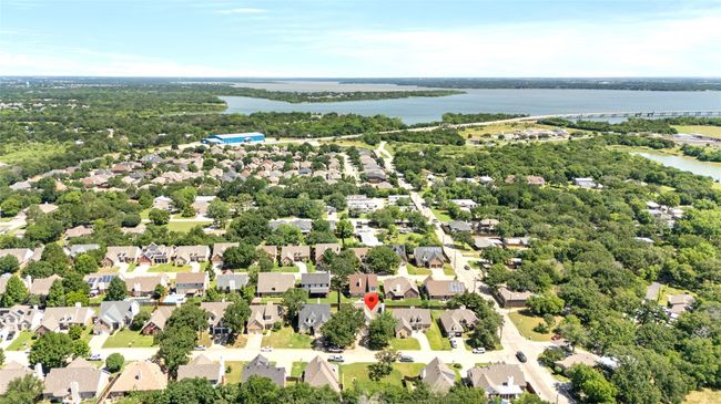 Aerial perspective of suburban area featuring a large body of water | Image 29