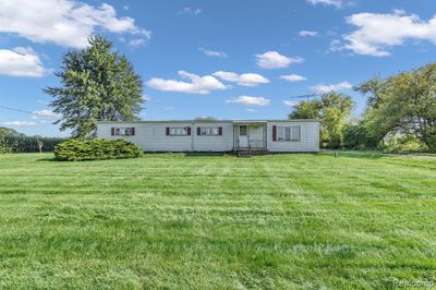 14363 Hough Road, Home with 3 bedrooms, 2 bathrooms and null parking in Berlin Twp MI | Image 1