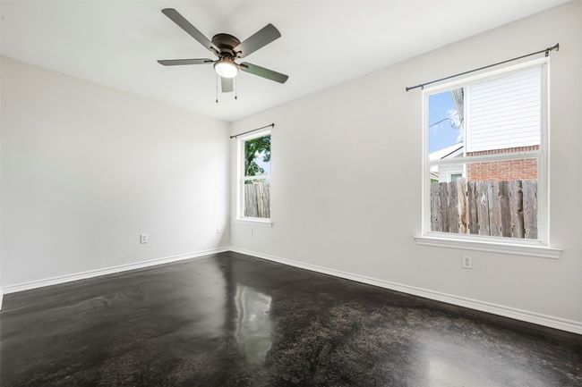 Spare room with finished concrete floors and ceiling​​‌​​​​‌​​‌‌​‌‌​​​‌‌​​‌‌​‌​​​​​‌ fan | Image 16