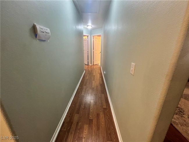 Corridor with hardwood / wood-style floors and baseboards | Image 47