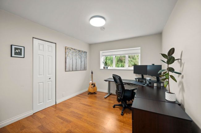 Office area featuring baseboards and light wood-type flooring | Image 24