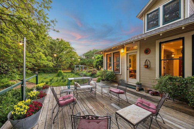 The porch off of the back of the house. | Image 31