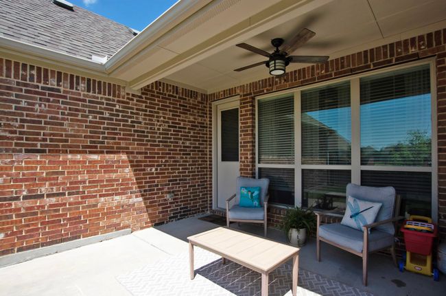 View of patio / terrace with a ceiling fan | Image 36