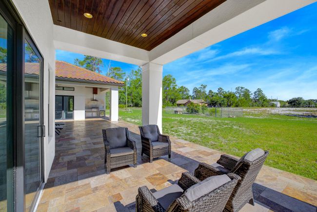 Downstairs master bedroom covered lanai | Image 41