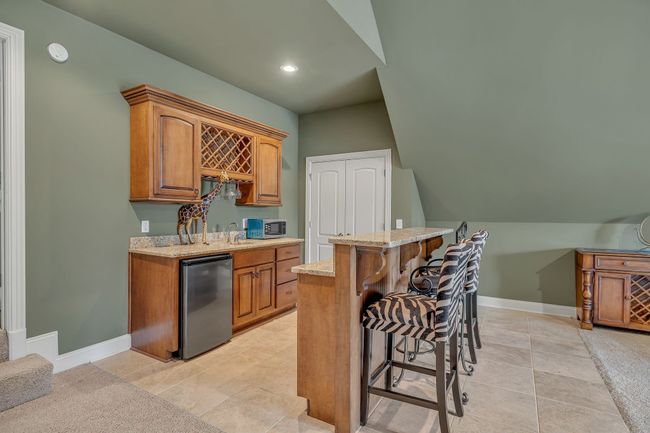 The wet bar has a lot to offer, whatever your preference. It's another touch to this excellent, exquisite Bonus Room! | Image 40