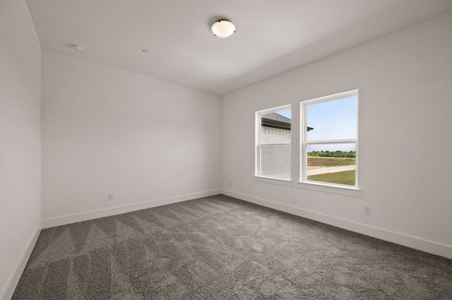 Our Bella plan offers a spacious secondary bedroom complete with en suite bath! | Image 15