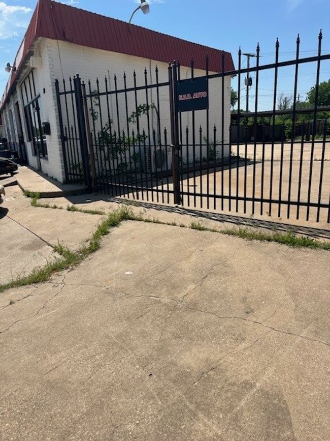 View of gate featuring fence | Image 23