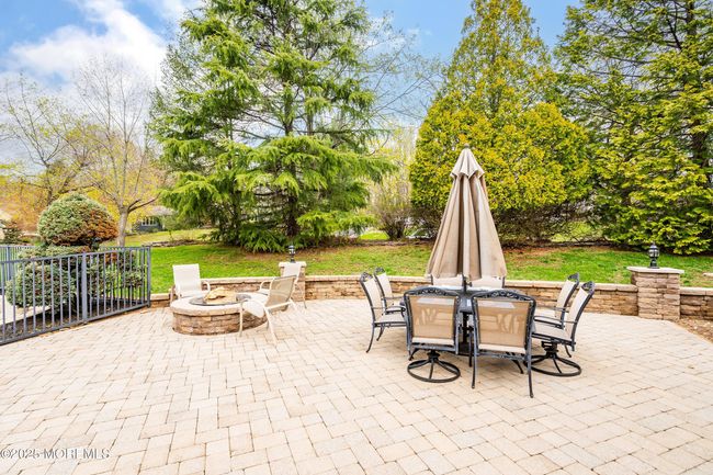Huge paver patio with firepit | Image 47