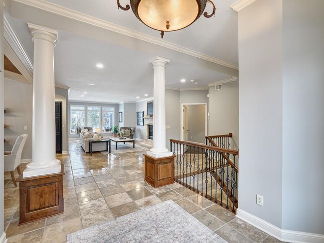 Step into luxury with this elegant main floor. | Image 7
