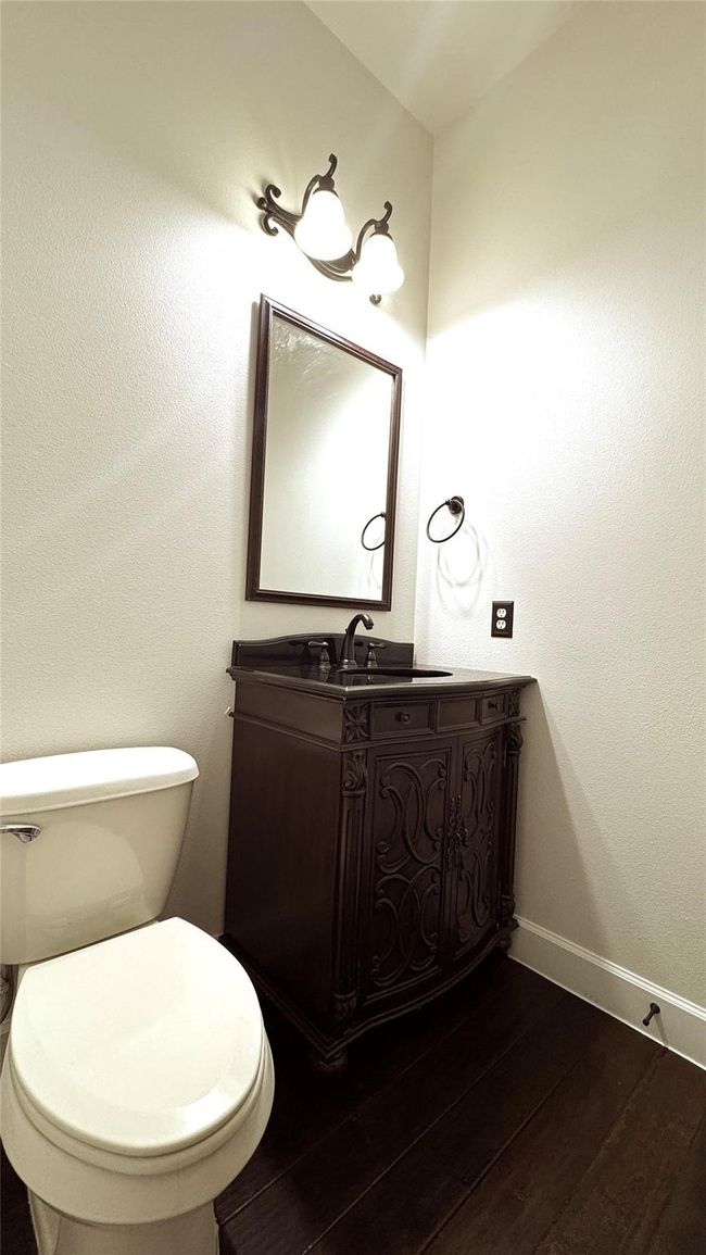 Bathroom featuring vanity and wood finished floors | Image 12