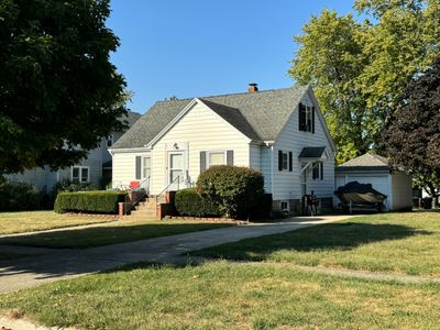 Side angle showing detached one car garage | Image 3