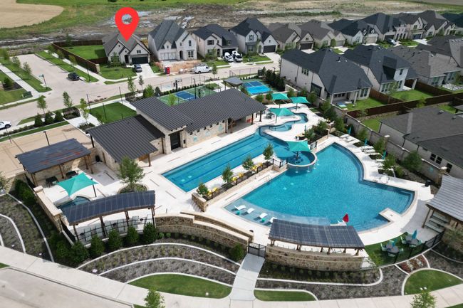 Aerial view of residential area featuring a pool area | Image 30