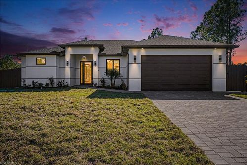 369 Woodburn Dr, LEHIGH ACRES, FL, 33972-1051 | Card Image