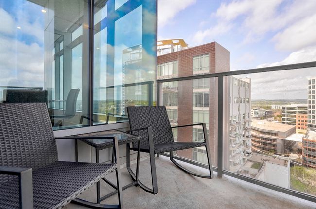 Balcony with a view of city | Image 26