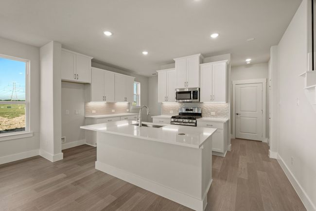 The chef will love being the center of attention in this gorgeous kitchen! | Image 10