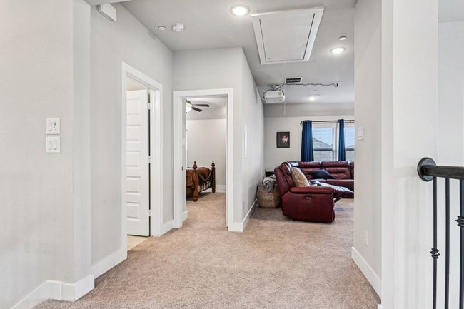 Corridor featuring attic access, carpet floors, and recessed lighting | Image 21