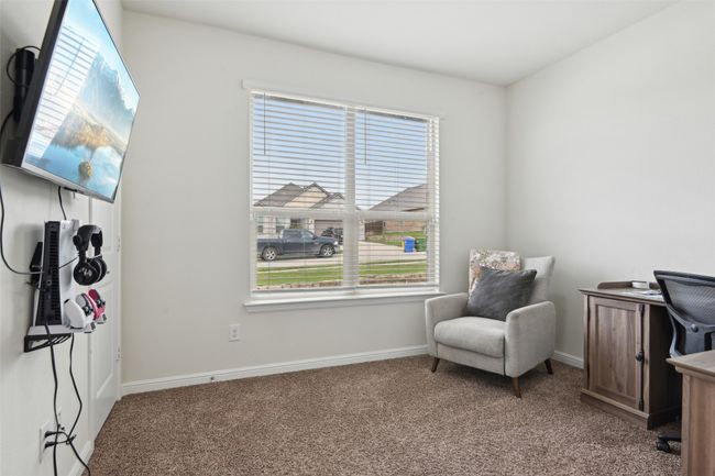Carpeted home office featuring baseboards | Image 21