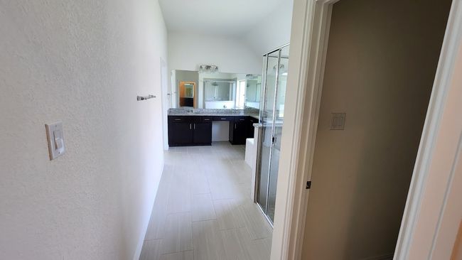 Hallway with a textured wall | Image 25