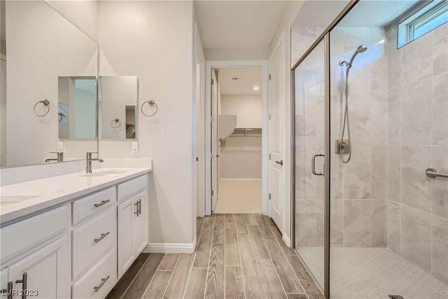 Bath with Dual Sinks, Open Shower with Seat and TOTO Toilet Seats | Image 8