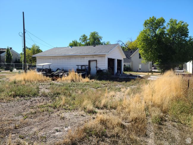 View of side of home featuring a garage | Image 33