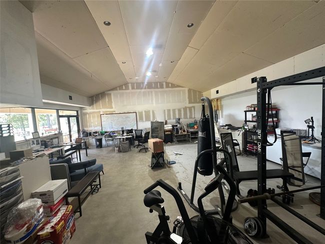 Exercise room featuring lofted ceiling | Image 15