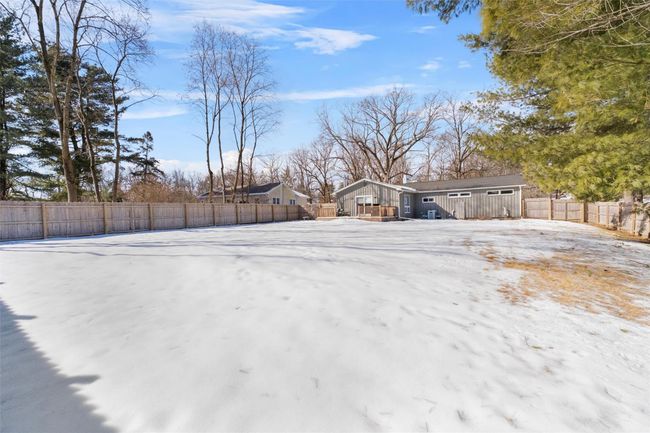 View of yard featuring a deck and fence private yard | Image 41