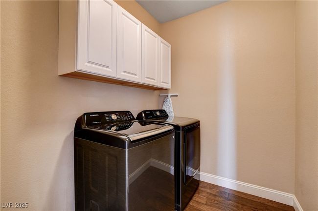 Upstairs Laundry Room includes cabinets | Image 42