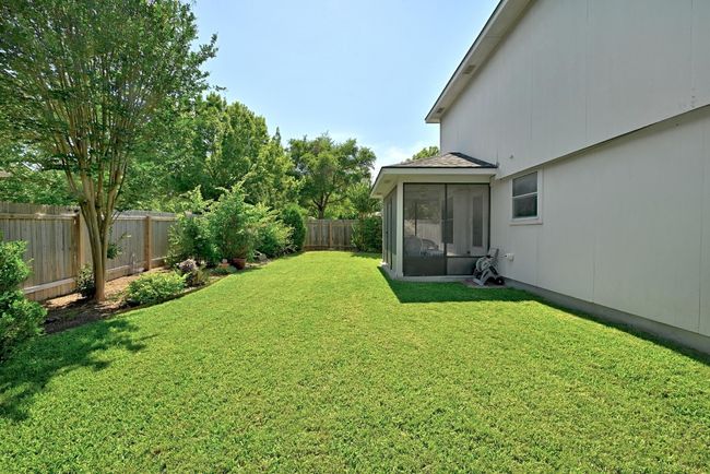 View of yard with a sunroom | Image 32