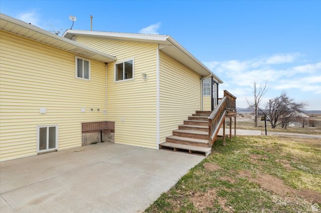 View of property exterior with a patio area | Image 29