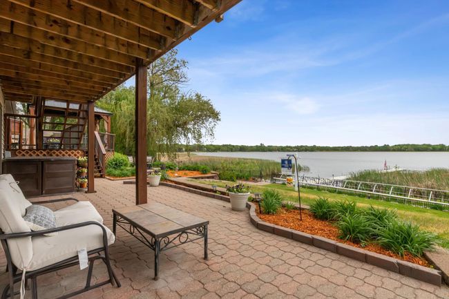 Expansive backyard patio with ample space for entertaining friends and famly | Image 37